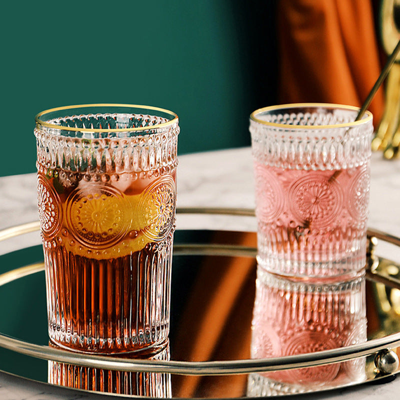 Gold-painted embossed glass tumbler